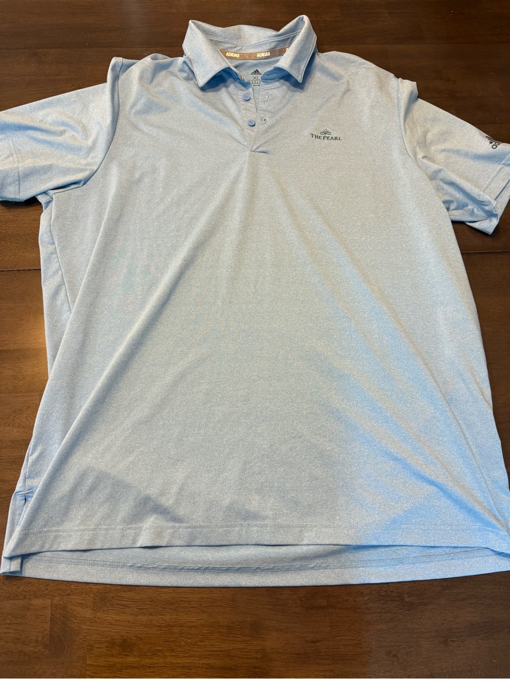 adidas Light Blue Men's Golf Polo from the pearl course